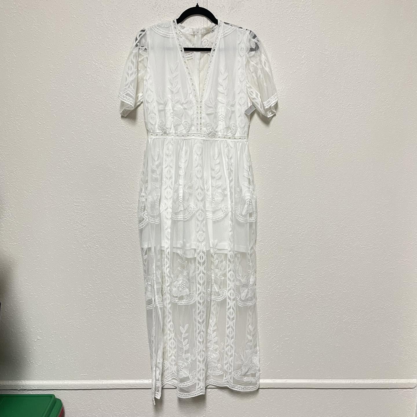 Romper Eleter Size Medium